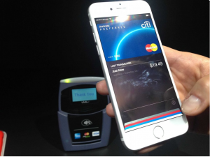 Apple Pay on iPhone6 with on board NFC chips to complete cashless transaction, Source: Businessinsider.com