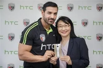 HTC chair Cher Wang and NorthEast United FC owner John Abraham
