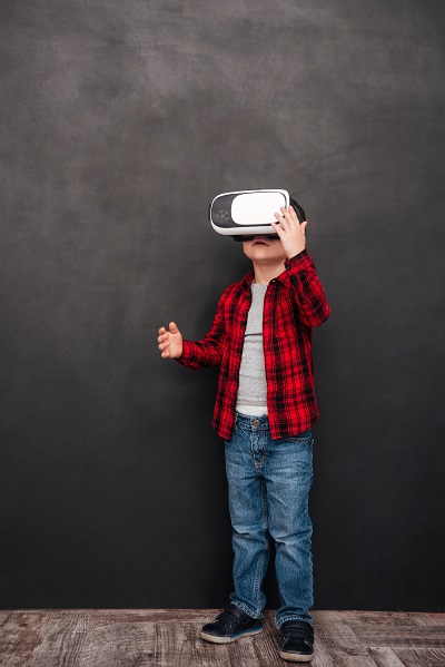 child wearing virtual reality